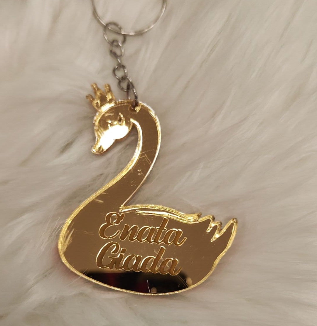 Segnaposto Bomboniera cerimonia Ciondolo Cigno Reale plexiglass Oro specchiato nascita